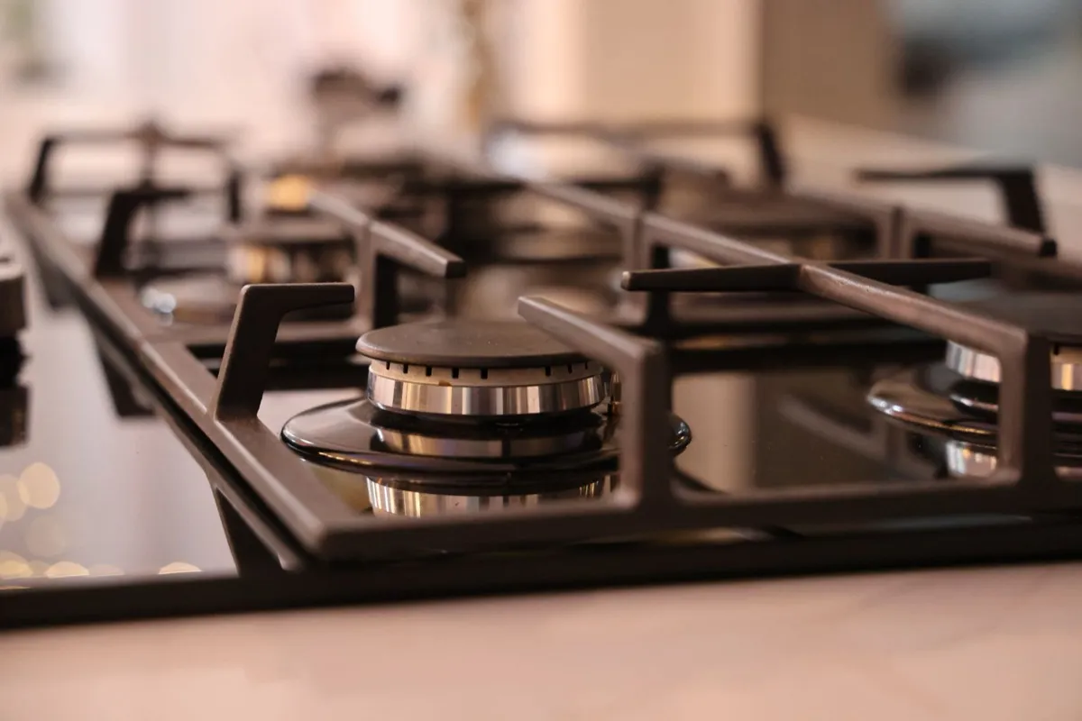 Gas cooktop burners in a kitchen